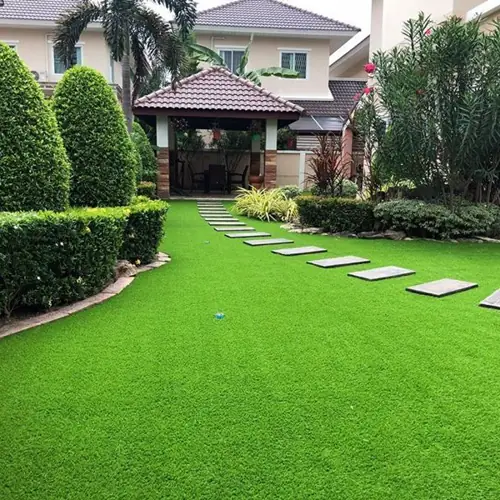 Artificial grass carpet offering a natural lawn look with zero maintenance.