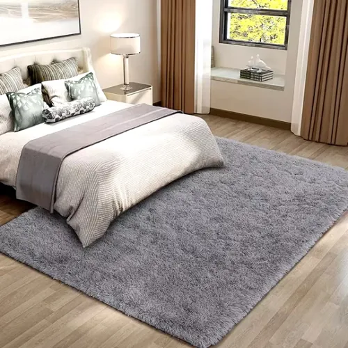 Chic carpet flooring adding character to a modern Dubai bedroom.