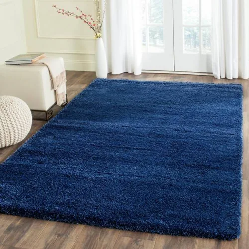 Deep ocean blue carpet for a dramatic, contemporary finish.