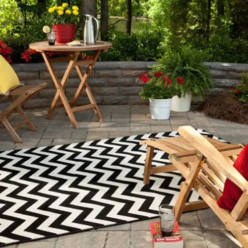 Elegant outdoor rug for open-air dining area