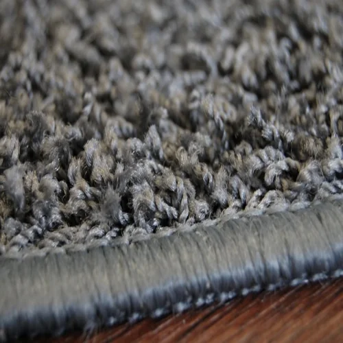 GLITTER wall-to-wall carpet with a subtle shimmer and glamorous texture—ideal for chic boutiques, modern bedrooms, and luxury interior spaces in Dubai.