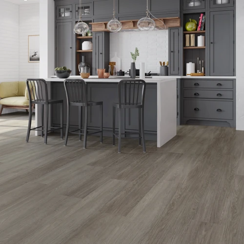 Grey-toned vinyl flooring in a sleek Dubai studio apartment-Glacial