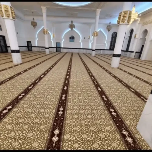 High-quality carpet used in mosques to define individual prayer spaces.