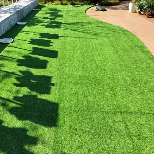 Maintenance-free grass carpet ideal for year-round greenery.