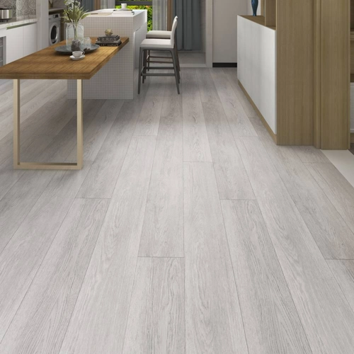 Modern white oak vinyl flooring in a minimalist Dubai living space.