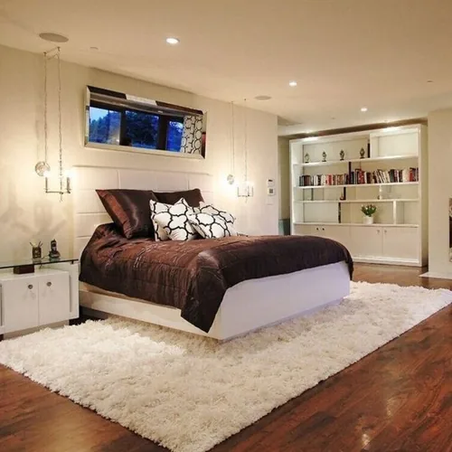 Plush carpet flooring for a cozy and inviting bedroom atmosphere.