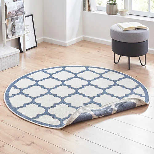 Round carpet with subtle geometric designs, tailored for Dubai-style interiors.