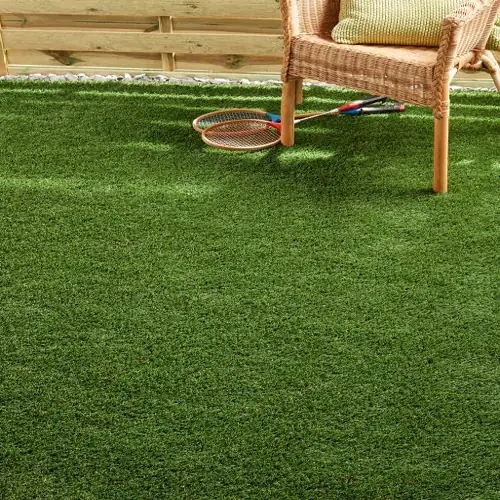 Savanna artificial grass carpet with earthy green tones and rugged, natural texture.