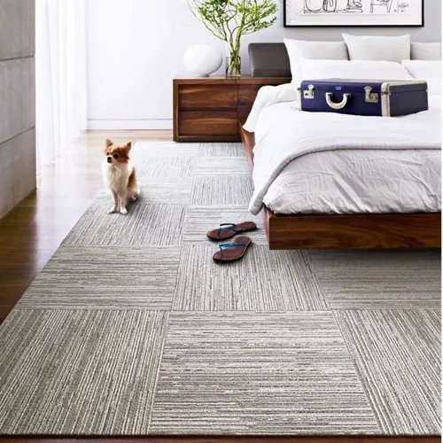 Soft textured carpet enhancing comfort in a master bedroom.