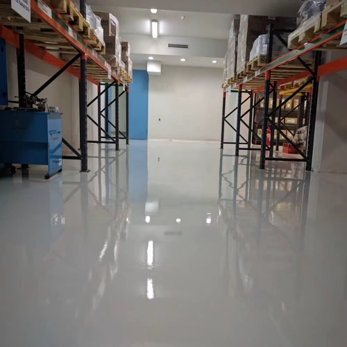 Anti-static epoxy flooring in a Dubai electronics manufacturing unit.