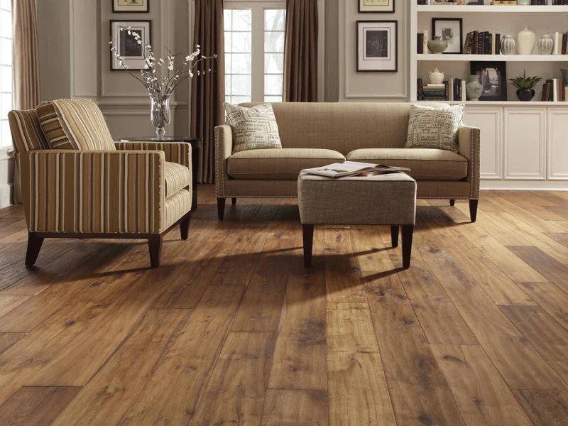 Cozy living room with light oak laminate flooring and comfortable furniture