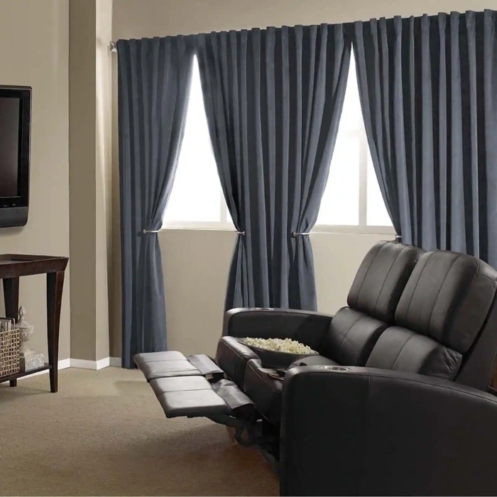 Dark blue-grey blackout curtains for home theater.