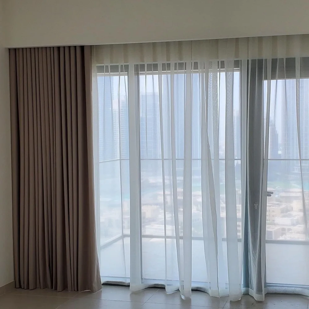 Energy-efficient motorized curtain installation in Dubai