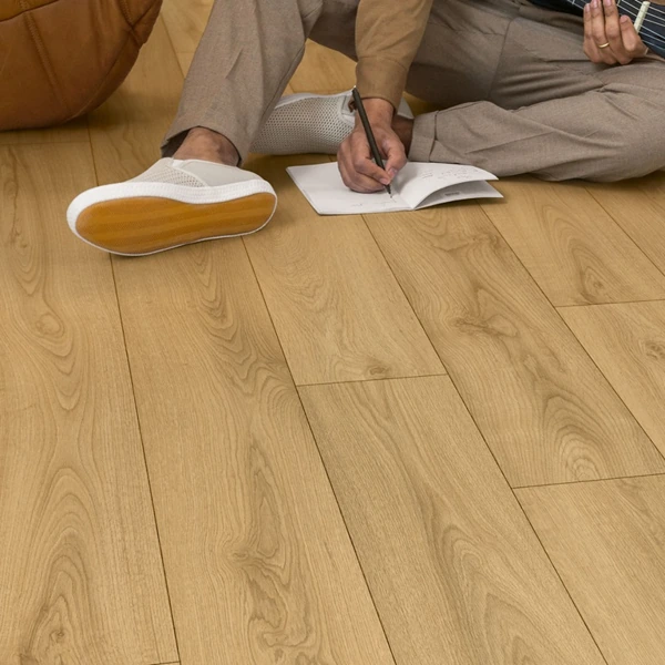 Laminate flooring installation in a residential bedroom