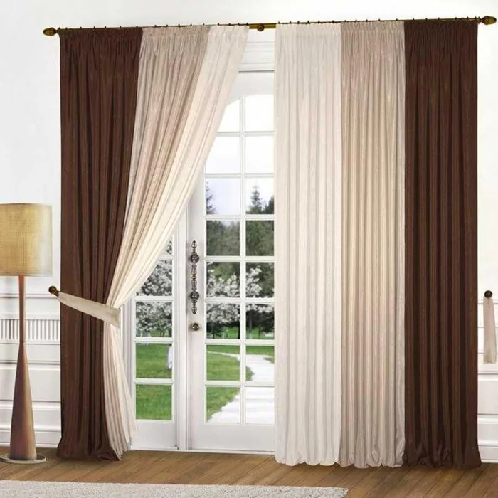 Multi-tone brown curtains for elegant door entrance.