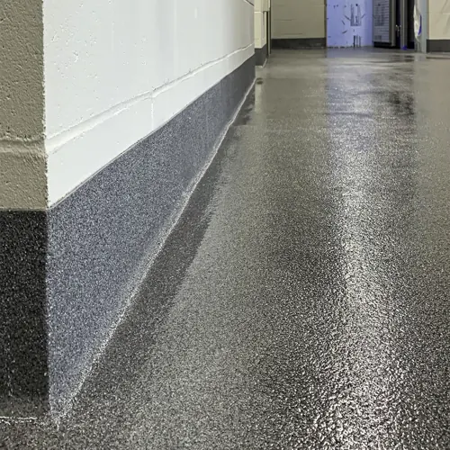 Quartz-filled epoxy flooring in a Dubai hospital for high durability and hygienic performance