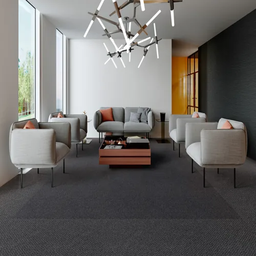 Redefine your workspace with the versatile styling of GENUS and VOLNAY TILE carpet tiles.