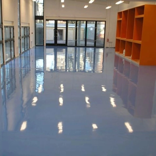 Seamless white epoxy flooring in a Dubai medical clinic ensuring hygiene and cleanliness