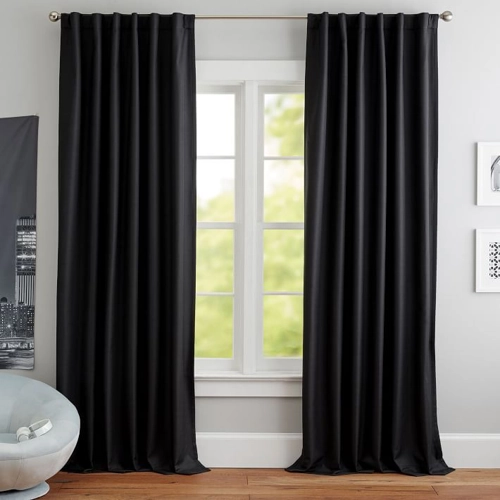 Sound-insulating blackout curtains for quiet and peaceful sleep in busy areas.