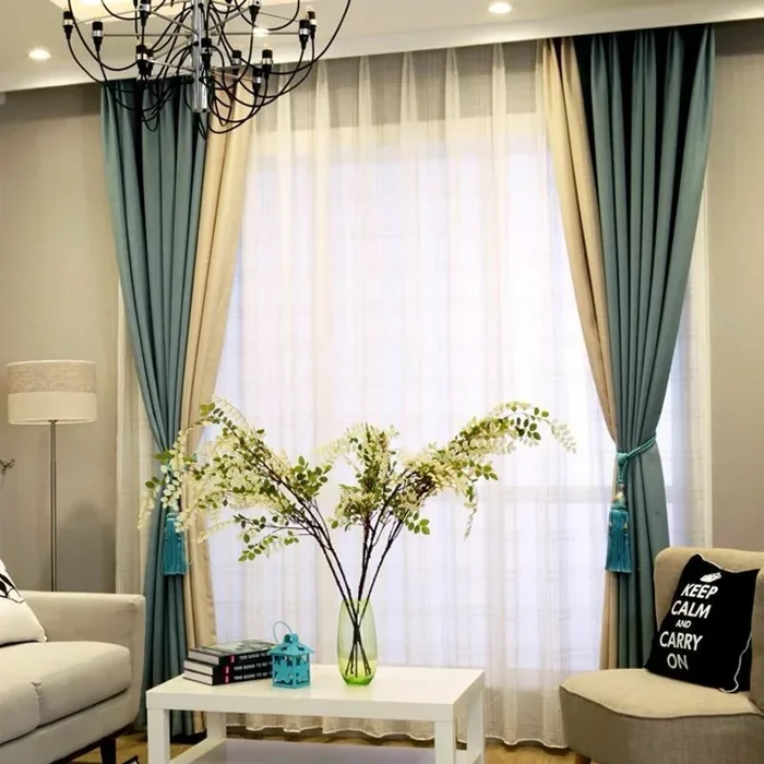 Stylish blue and beige layered curtains in living room