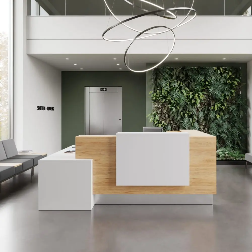 A stylish and modern office lobby or reception area with a prominent living green wall of assorted plants.