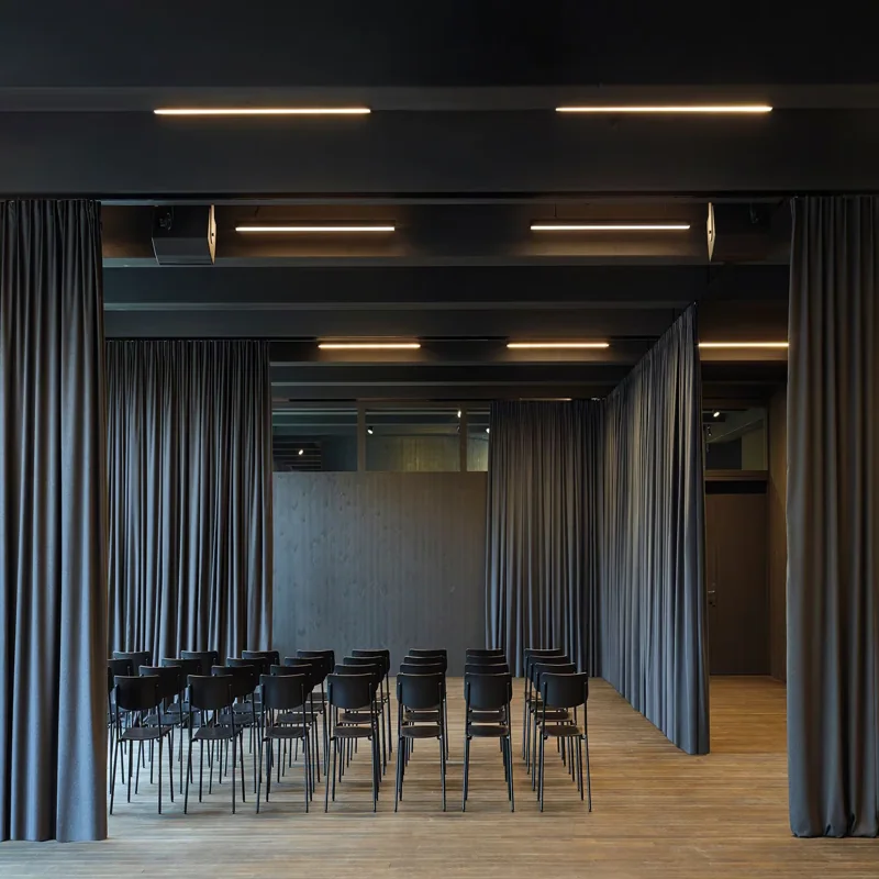 Motorized office curtains in Dubai – smart window coverings with remote control functionality.