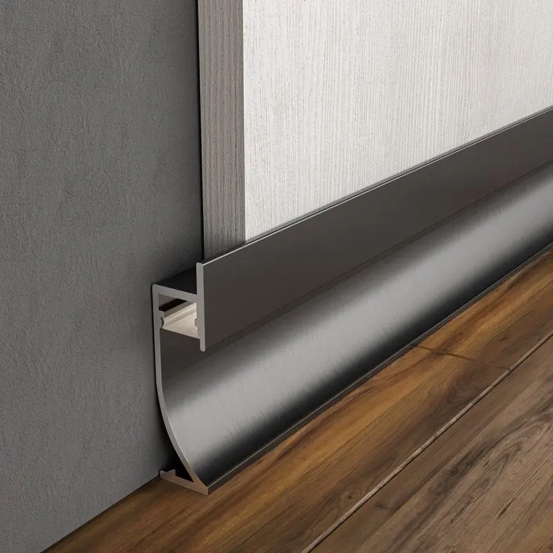 Recessed aluminum skirting installed for a flush, clean wall finish