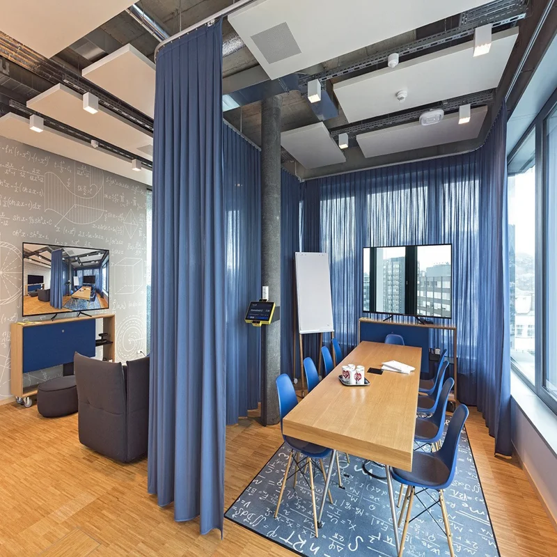 Wave curtains for offices – sleek and modern window coverings for a clean, professional look.